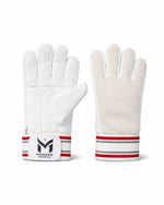 Manger wicketkeeping inners shown on a mannequin, designed for cricket wicketkeepers to enhance comfort and performance.