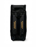 Black and gold Manger X-Pro Edition premium kit bag with sturdy handles and spacious compartments for travel and sports gear.