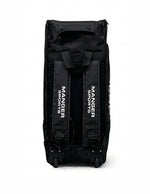 Manger X-Pro Edition premium kit bag in black and white with multiple compartments and sturdy straps for travel and storage.