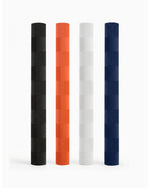 DSC Chevron colored bat grip lineup in four colors, showcasing vibrant design and textured surface for grip.