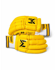 Yellow Manger Pro 89 Edition batting gloves with padded palms and adjustable wrist straps.