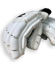 Cooper Bison 24 batting gloves with padded palms and adjustable wrist straps, designed for cricket or baseball players.