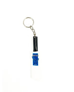 Versus customized mini cricket bat keychain, white with blue Versus label