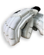 Cooper Bison 24 batting gloves with padded palms and adjustable wrist straps.