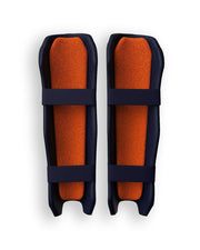 Moonwalkr Wicket Keeping Shin Guards, durable protective gear, shown in black with adjustable straps.