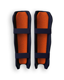 Moonwalkr Wicket Keeping Shin Guards, durable protective gear, shown in black with adjustable straps.