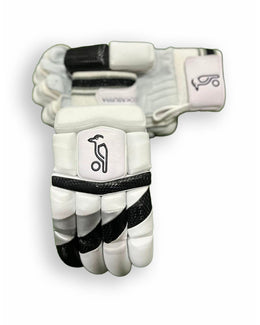 Black and grey Kookaburra batting gloves with padded palms and adjustable wrist straps.
