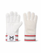 Manger wicketkeeping inners shown on a mannequin, designed for cricket wicketkeepers to enhance comfort and performance.