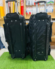 Manger X-Pro Elite Coffin Wheelie Bag with sturdy wheels and side handles.