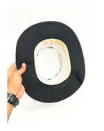 Black floppy cricket hat, inside view showing brim and inner band