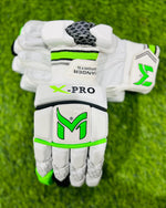 Green Manger X-Pro batting gloves with padded palms and adjustable wrist straps.