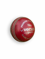 Red Versus Club Match Ball showing the textured surface and vibrant red color, designed for professional soccer matches.