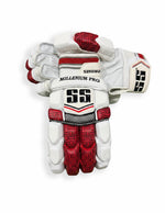 Red SS batting gloves with padded palms and adjustable straps for cricket batting.
