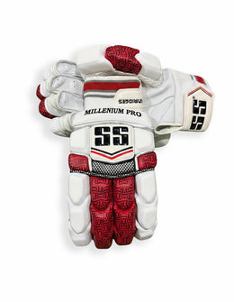 Red SS batting gloves with padded palms and adjustable straps for cricket batting.
