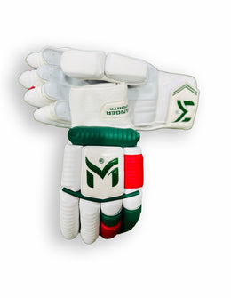 Red and green Manger Pro 89 Edition batting gloves with padded palms and adjustable wrist straps, designed for cricket players.
