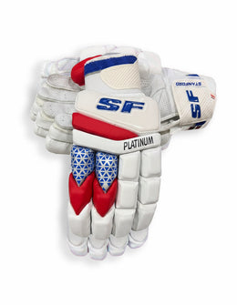 Red and white SF Platinum batting gloves with padded palms and adjustable wrist straps, designed for cricket or baseball players.