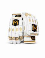 White and gold Manger batting gloves designed for beginners, featuring padded palms and adjustable wrist straps.